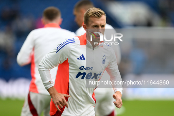 James Ward-Prowse of Nottingham Forest warms up ahead of kick-off during the Premier League match between Chelsea and Nottingham Forest at S...