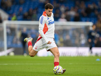 Neco Williams of Nottingham Forest warms up ahead of kick-off during the Premier League match between Chelsea and Nottingham Forest at Stamf...