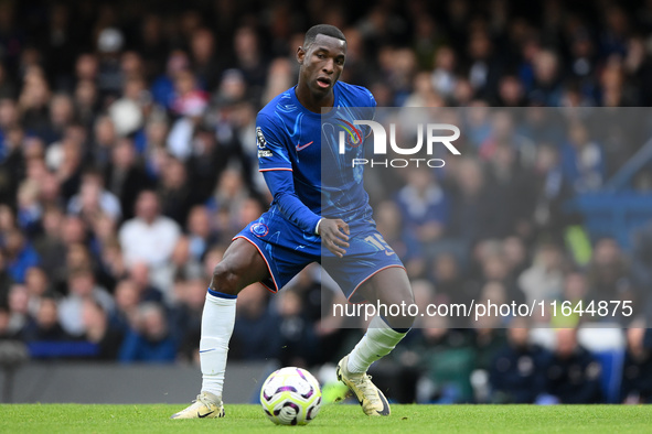 Nicolas Jackson of Chelsea is in action during the Premier League match between Chelsea and Nottingham Forest at Stamford Bridge in London,...