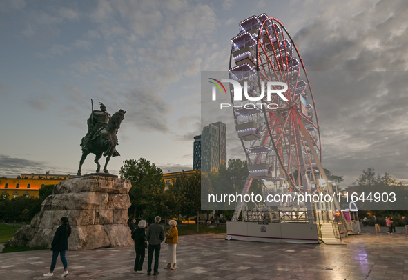 TIRANA, ALBANIA - SEPTEMBER 16:   
A Ferris wheel in Tirana, next to the Skanderbeg Monument in Skanderbeg Square, seen on September 16, 202...