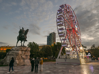 TIRANA, ALBANIA - SEPTEMBER 16:   
A Ferris wheel in Tirana, next to the Skanderbeg Monument in Skanderbeg Square, seen on September 16, 202...