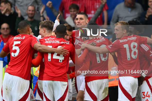 The Reds celebrate after Chris Wood of Nottingham Forest scores a goal to make it 0-1 during the Premier League match between Chelsea and No...