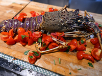 TIRANA, ALBANIA - SEPTEMBER 16:   
Preparation of a lobster in a local seafood restaurant, seen on September 16, 2024, in Tirana, Albania. (