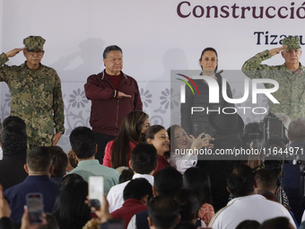 Claudia Sheinbaum (blue jacket), President of Mexico, signs the start of preliminary studies for the construction of the CDMX-Hidalgo-Monter...