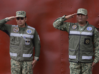 Members of the Mexican Army greet Claudia Sheinbaum, President of Mexico, in Tizayuca, Hidalgo, on October 6, 2024, during the signing of th...