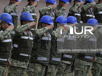 Members of the Mexican Army greet Claudia Sheinbaum, President of Mexico, in Tizayuca, Hidalgo, on October 6, 2024, during the signing of th...