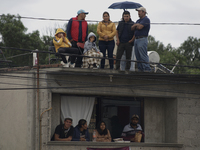 Supporters of Claudia Sheinbaum, President of Mexico, accompany her during the signing of the start of preliminary studies for the construct...