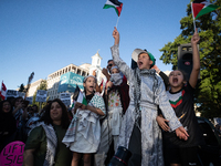 Children lead chants of ''Free Palestine'' during a demonstration demanding ceasefires in Palestine and Lebanon at the White House in Washin...