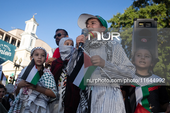 Children lead chants of ''Free Palestine'' during a demonstration demanding ceasefires in Palestine and Lebanon at the White House in Washin...