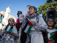 Children lead chants of ''Free Palestine'' during a demonstration demanding ceasefires in Palestine and Lebanon at the White House in Washin...