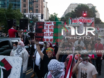 People demand ceasefires in Palestine and Lebanon in Washington, DC, on October 5, 2024. The protest is one of many worldwide marking one ye...