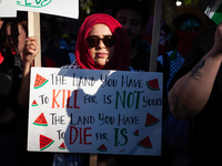 People demand ceasefires in Palestine and Lebanon at the White House in Washington, DC, on October 5, 2024. The protest is one of many world...