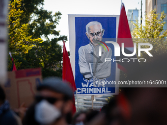 People demand ceasefires in Palestine and Lebanon at the White House in Washington, DC, on October 5, 2024. The protest is one of many world...