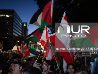 People demand ceasefires in Palestine and Lebanon in Washington, DC, on October 5, 2024. The protest is one of many worldwide marking one ye...