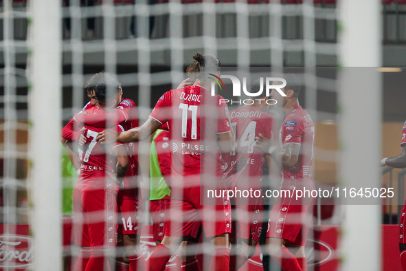 The team of AC Monza celebrates a goal during the match between AC Monza and AS Roma in Serie A at U-Power Stadium in Monza, Italy, on Octob...