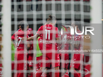 The team of AC Monza celebrates a goal during the match between AC Monza and AS Roma in Serie A at U-Power Stadium in Monza, Italy, on Octob...