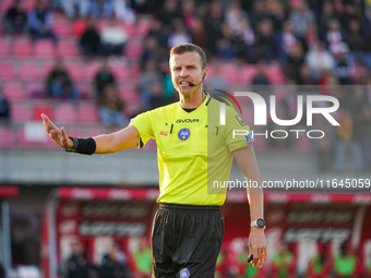 Federico La Penna serves as the referee during the AC Monza against AS Roma Serie A match at U-Power Stadium in Monza, Italy, on October 6,...