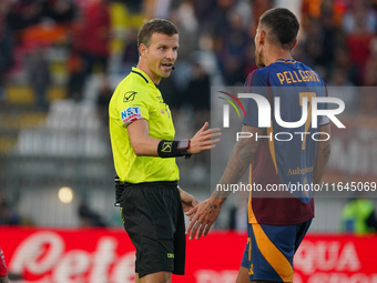 Federico La Penna serves as the referee during the AC Monza against AS Roma Serie A match at U-Power Stadium in Monza, Italy, on October 6,...