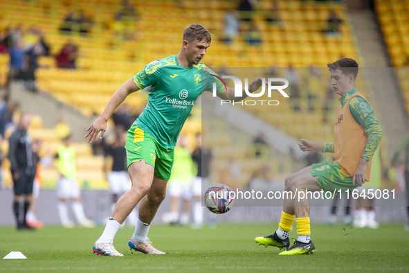 Callum Doyle of Norwich City and Kellen Fisher of Norwich City warm up before the Sky Bet Championship match between Norwich City and Hull C...