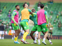 Jose Cordoba of Norwich City and Shane Duffy of Norwich City warm up before the Sky Bet Championship match between Norwich City and Hull Cit...