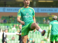 Callum Doyle of Norwich City warms up before the Sky Bet Championship match between Norwich City and Hull City at Carrow Road in Norwich, En...