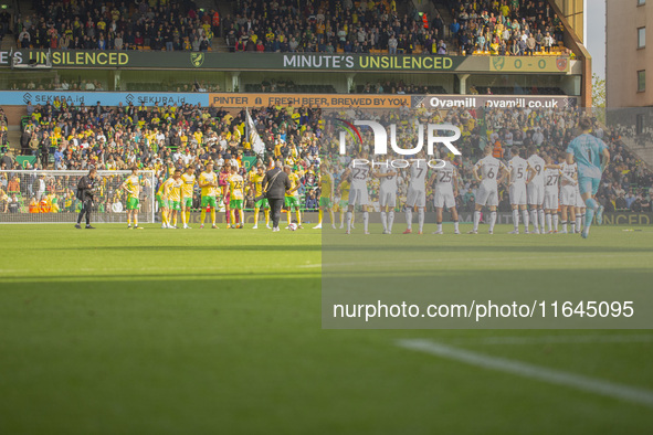 Norwich City and Hull City players participate in the one-minute unsilenced before the Sky Bet Championship match between Norwich City and H...