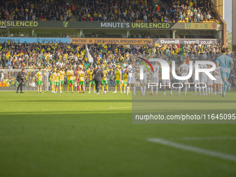 Norwich City and Hull City players participate in the one-minute unsilenced before the Sky Bet Championship match between Norwich City and H...