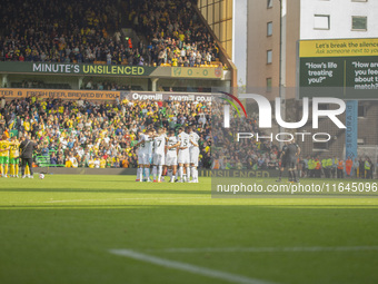 Norwich City and Hull City players participate in the one-minute unsilenced before the Sky Bet Championship match between Norwich City and H...