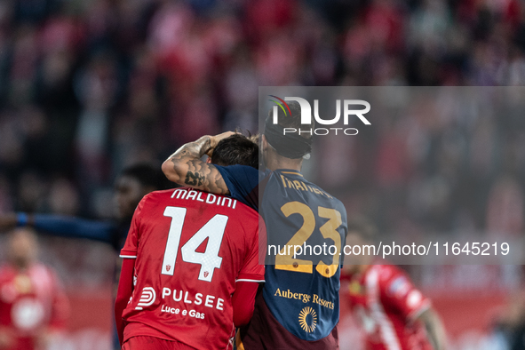 Gianluca Mancini of AS Roma and Daniel Maldini of AC Monza participate in the Serie A match between Monza and AS Roma at U-Power Stadium in...