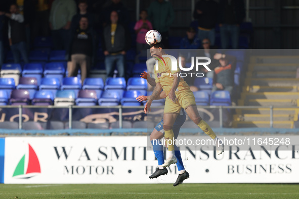 Josh Coley of Sutton United challenges David Ferguson of Hartlepool United for a header during the Vanarama National League match between Ha...