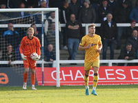 Will Davies of Sutton United and Brad Young of Hartlepool United participate in the Vanarama National League match between Hartlepool United...