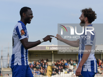 Mani Dieseruvwe of Hartlepool United celebrates with Anthony Mancini after scoring to give them a 3-2 lead during the Vanarama National Leag...