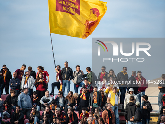 AS Roma fans wave a flag before the Serie A match between Monza and AS Roma at U-Power Stadium in Monza, Italy, on October 6, 2024. (