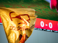 AS Roma fans wave a flag during the Serie A match between Monza and AS Roma at U-Power Stadium in Monza, Italy, on October 6, 2024. (