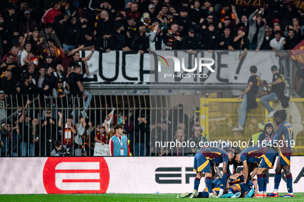 AS Roma players celebrate a goal during the Serie A match between Monza and AS Roma at U-Power Stadium in Monza, Italy, on October 6, 2024. 