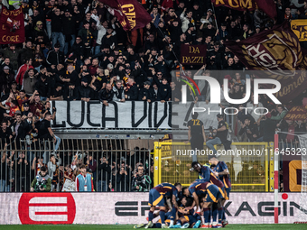 AS Roma players celebrate a goal during the Serie A match between Monza and AS Roma at U-Power Stadium in Monza, Italy, on October 6, 2024....