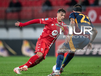 Gianluca Mancini of AS Roma and Daniel Maldini of AC Monza play during the Serie A match between Monza and AS Roma at U-Power Stadium in Mon...