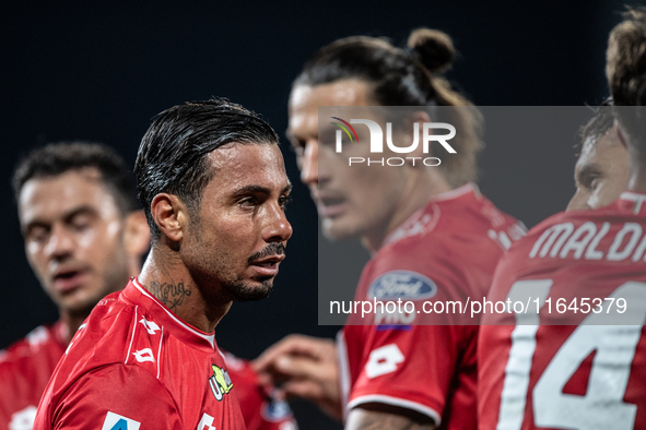 Armando Izzo and Milan Duric of AC Monza play during the Serie A match between Monza and AS Roma at U-Power Stadium in Monza, Italy, on Octo...