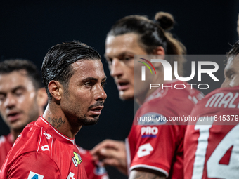 Armando Izzo and Milan Duric of AC Monza play during the Serie A match between Monza and AS Roma at U-Power Stadium in Monza, Italy, on Octo...