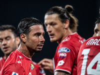 Armando Izzo and Milan Duric of AC Monza play during the Serie A match between Monza and AS Roma at U-Power Stadium in Monza, Italy, on Octo...