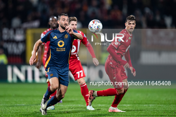 Bryan Cristante of AS Roma and Daniel Maldini of AC Monza play during the Serie A match between Monza and AS Roma at U-Power Stadium in Monz...