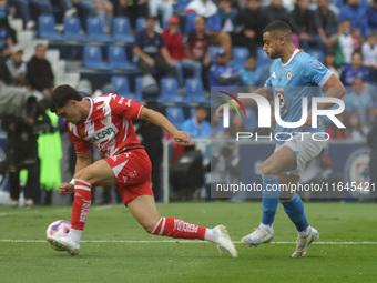 Willer Ditta #4 of Cruz Azul and Jose Paradela #10 of Club Necaxa battle for the ball during the 11th round match of the Torneo de Apertura...