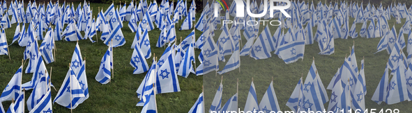 Hundreds of Israeli flags are outside a synagogue as Jews mark the one-year anniversary of the October 7th attack that sparks the Israel-Ham...