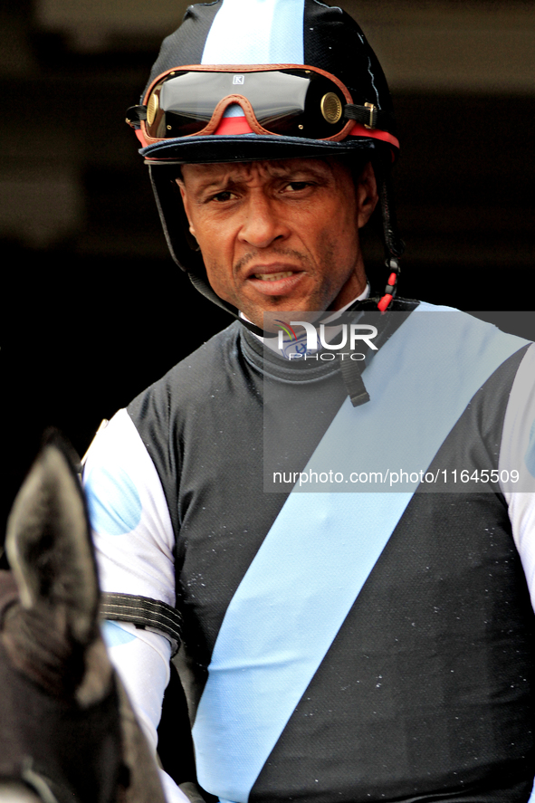 Jockey Patrick Husbands leaves the paddock ahead of the third race at Woodbine Racetrack in Toronto, Canada, on October 6, 2024. 