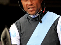 Jockey Patrick Husbands leaves the paddock ahead of the third race at Woodbine Racetrack in Toronto, Canada, on October 6, 2024. (