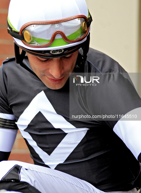 Jockey Sahin Civaci leaves the paddock ahead of the third race at Woodbine Racetrack in Toronto, Canada, on October 6, 2024. 