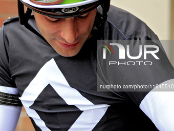 Jockey Sahin Civaci leaves the paddock ahead of the third race at Woodbine Racetrack in Toronto, Canada, on October 6, 2024. (