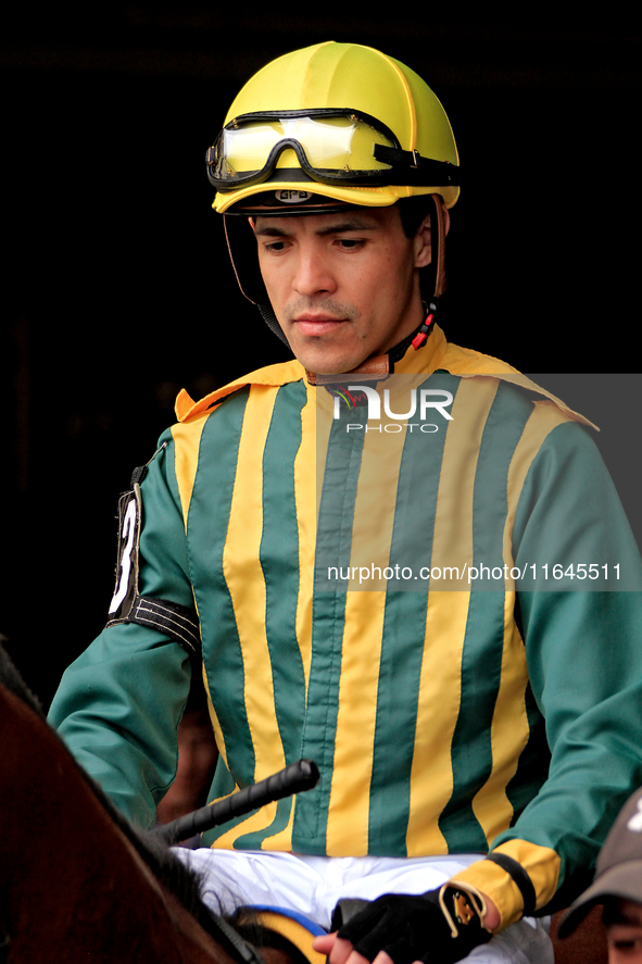 Jockey Eswan Flores leaves the paddock ahead of the third race at Woodbine Racetrack in Toronto, Canada, on October 6, 2024. 