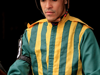 Jockey Eswan Flores leaves the paddock ahead of the third race at Woodbine Racetrack in Toronto, Canada, on October 6, 2024. (