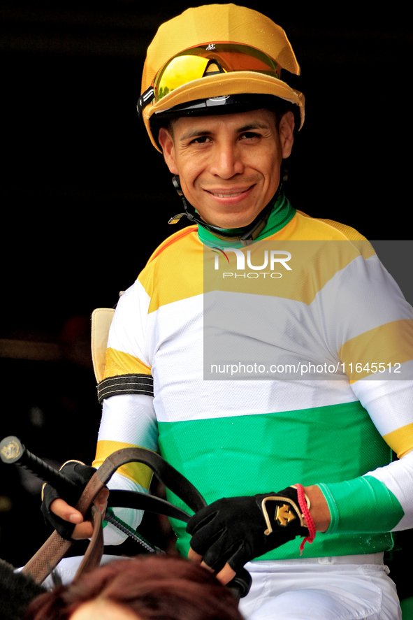 Jockey Jose Campos leaves the paddock ahead of the third race at Woodbine Racetrack in Toronto, Canada, on October 6, 2024. 